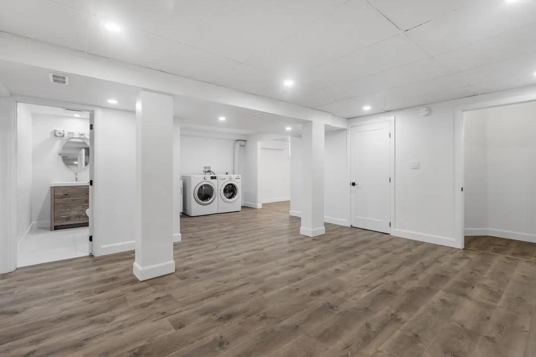 Clean finished basement with utility room