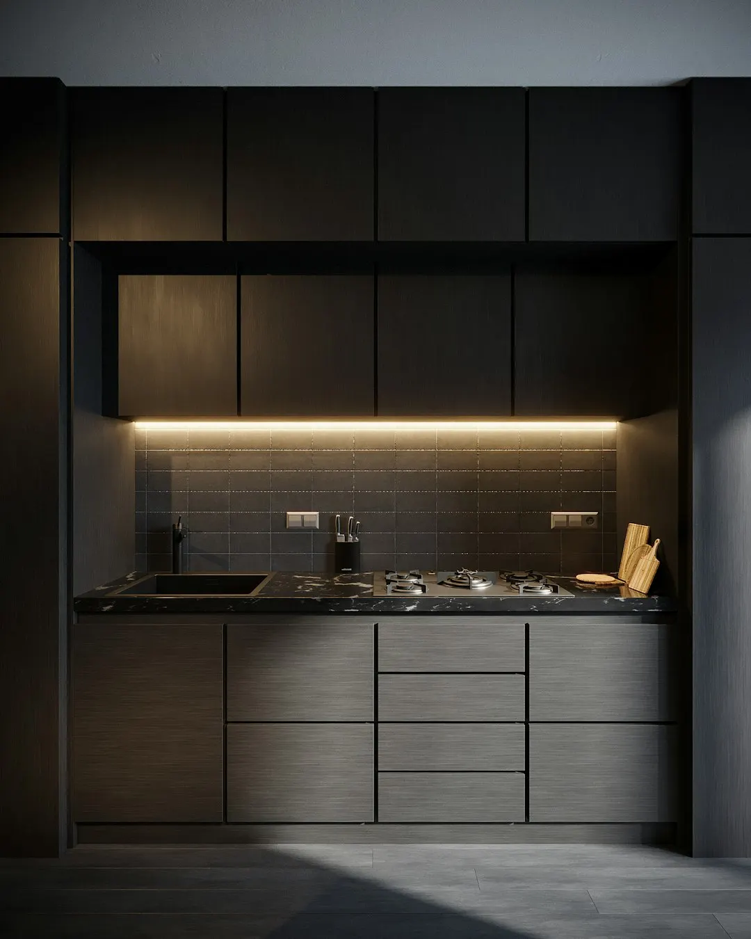 Dark compact residential kitchen