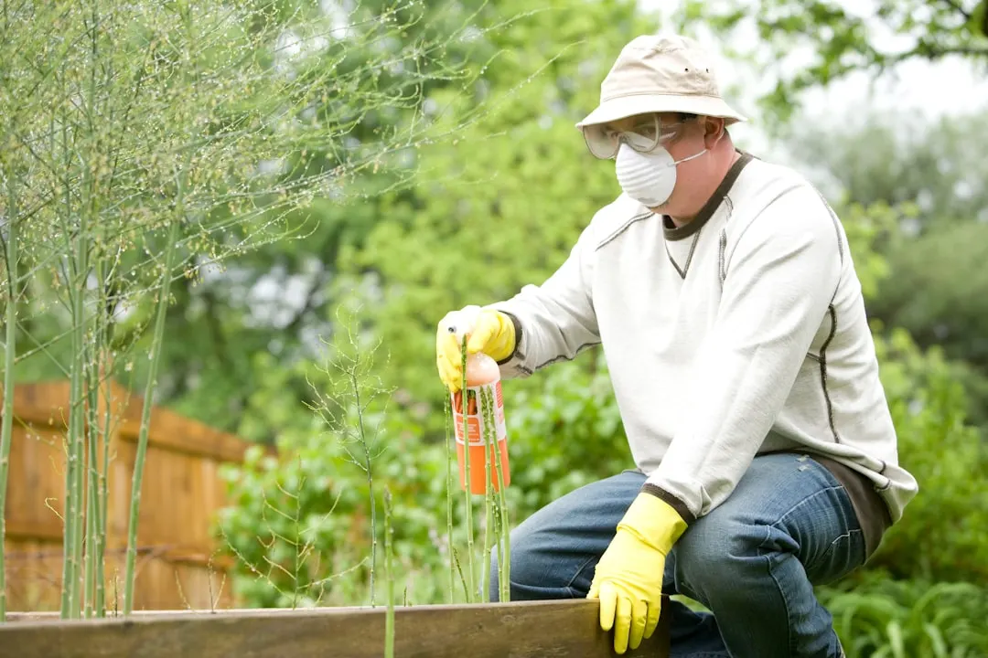Pest-control worker in protective equipment