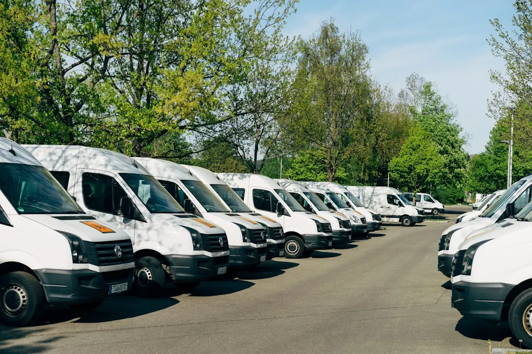 Fleet of white mobile service vans